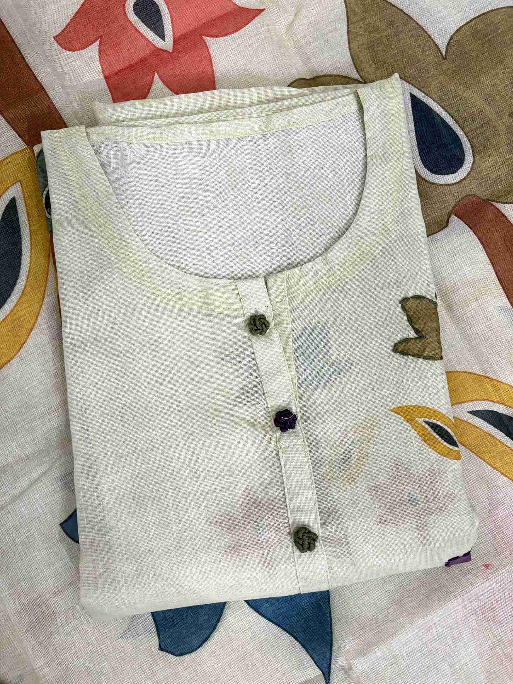 Multicolor geometric botanical leaf and branch digital print on side panel of light pista linen shirt