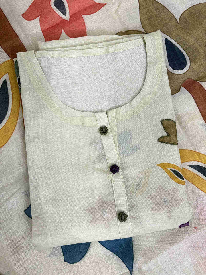 Multicolor geometric botanical leaf and branch digital print on side panel of light pista linen shirt