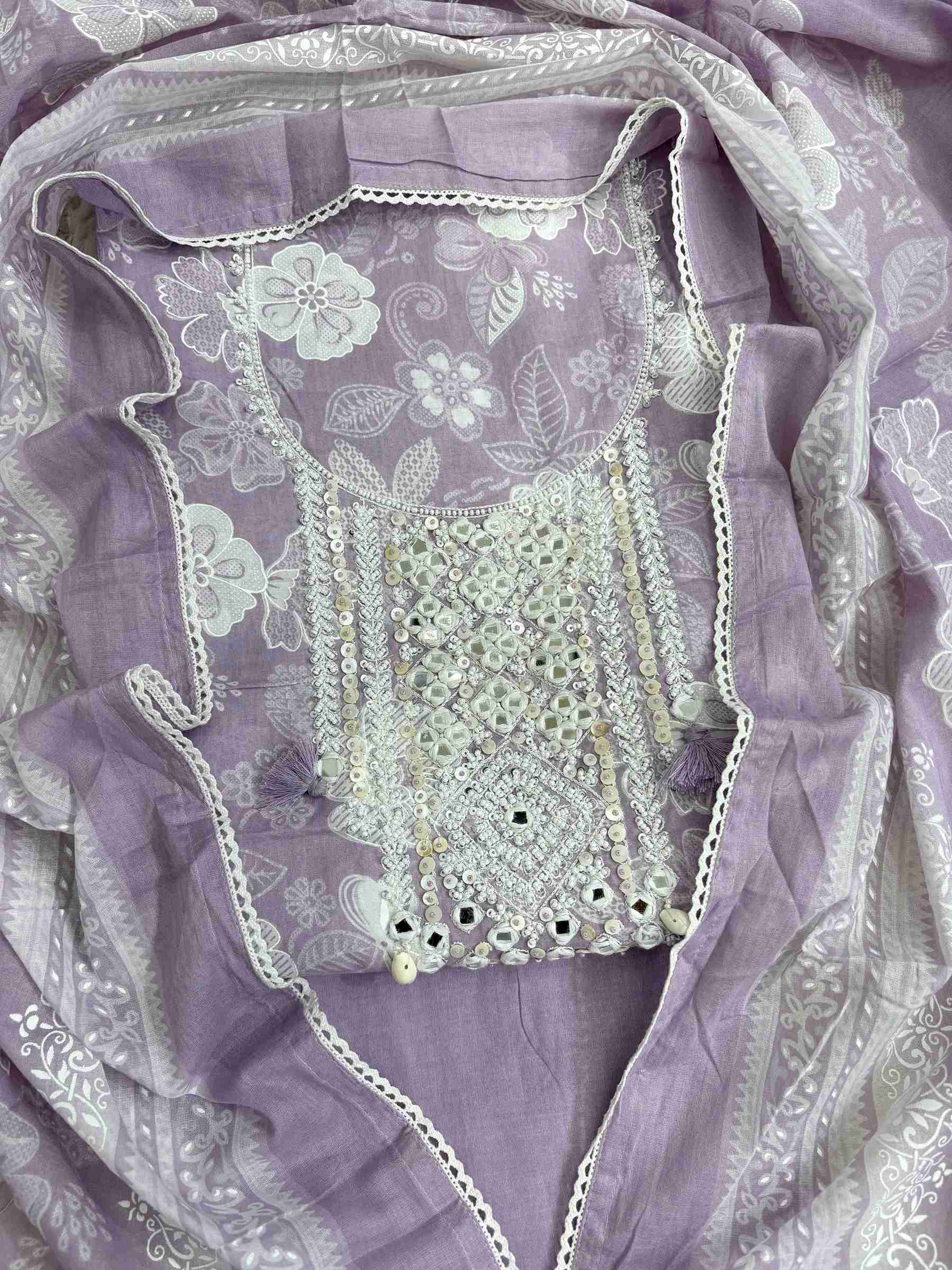 All-over white floral texture print detail across lilac cotton shirt body