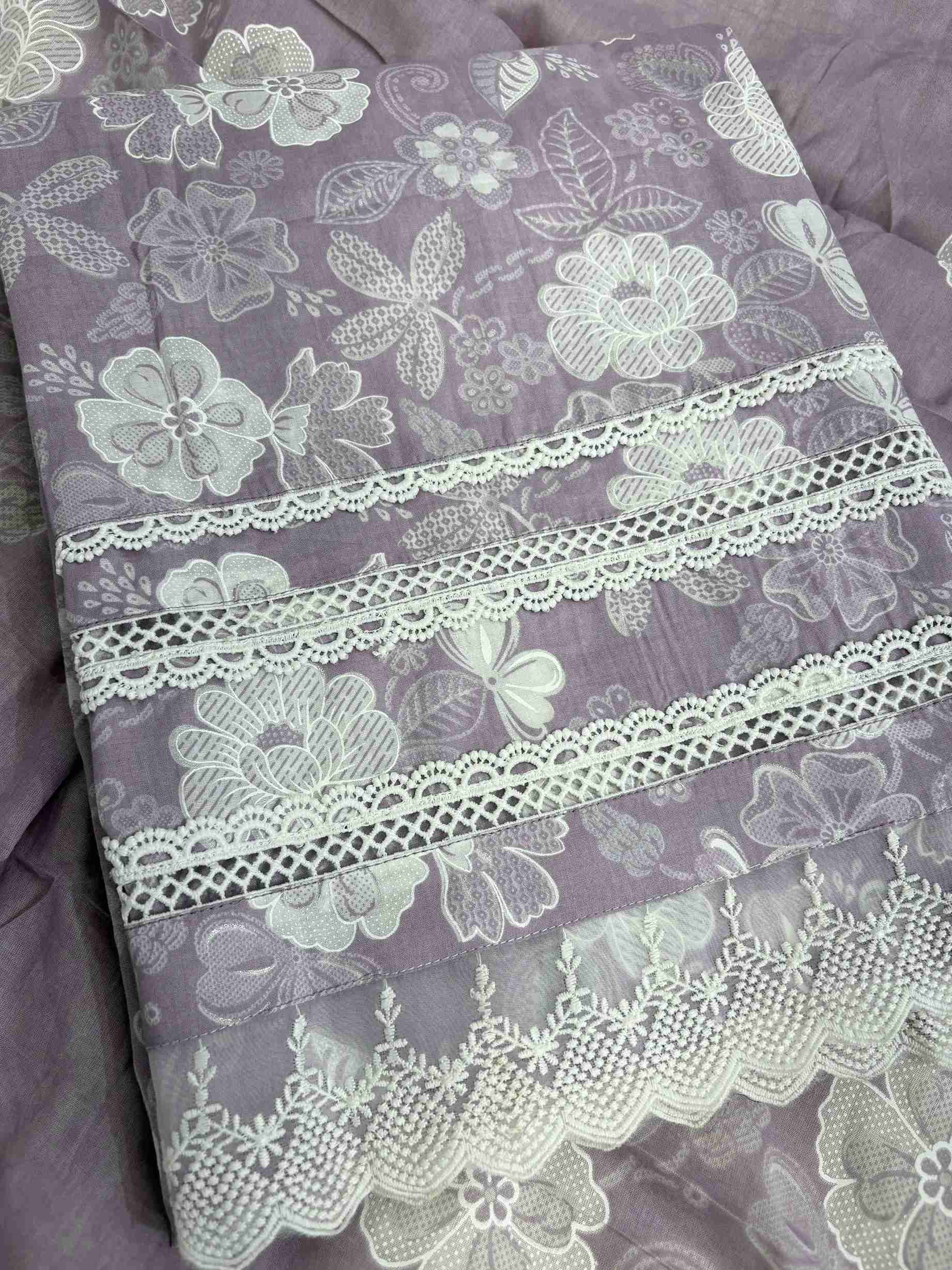 Multiple row crotia lace hemline finishing detail at the bottom of lilac cotton shirt