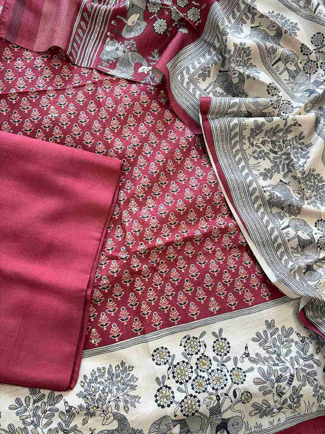 Cream hemline border with printed animal-tree scene on maroon chanderi silk suit
