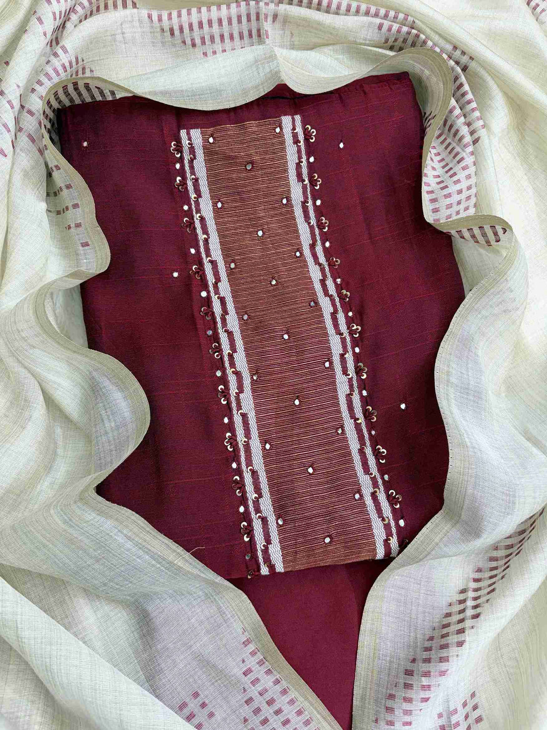 Close view of maroon viscose shirt featuring mirror highlight detailing on neckline