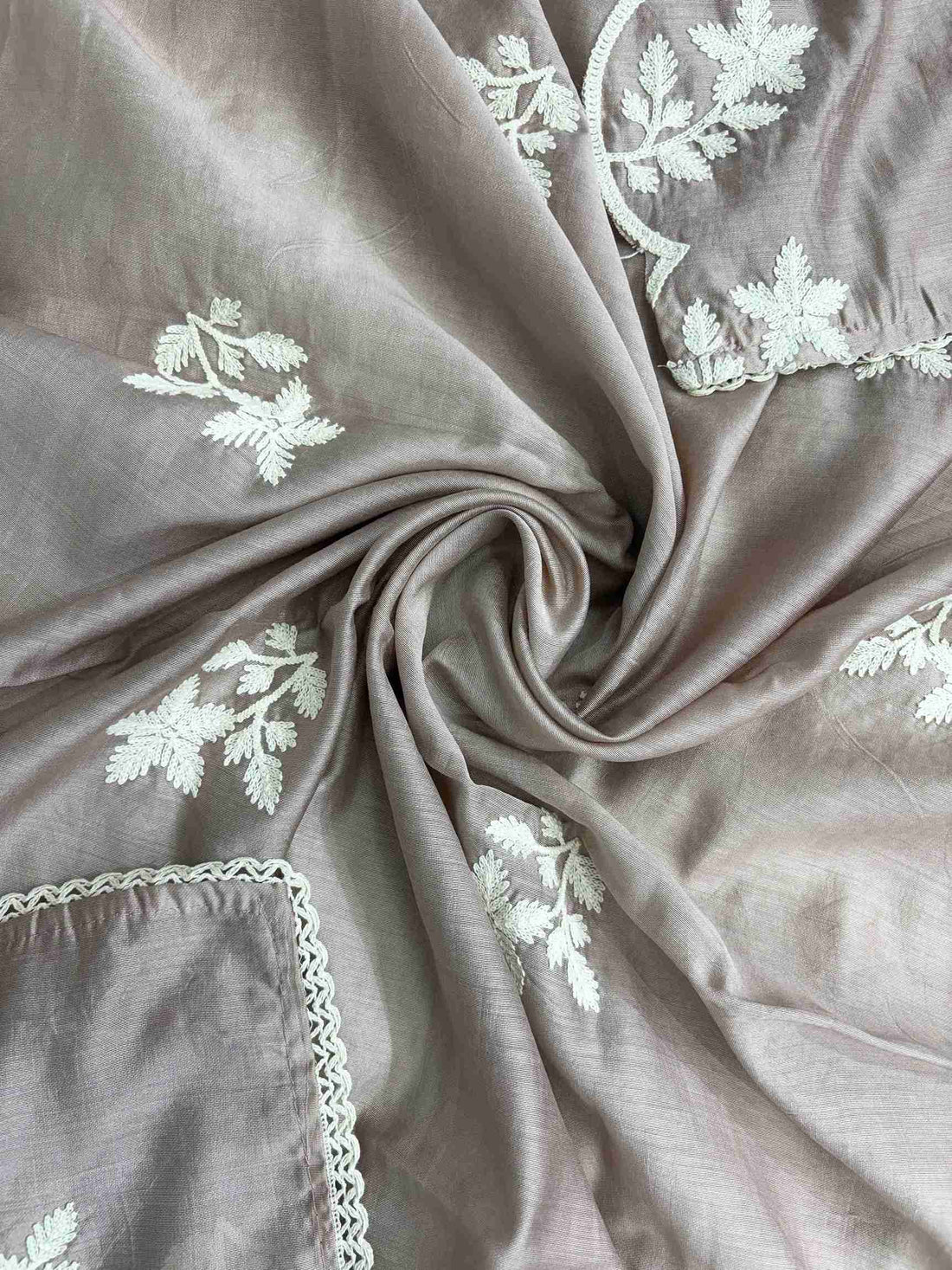 All-over crotia embroidered floral and vine motifs across mauve jaam cotton dupatta surface