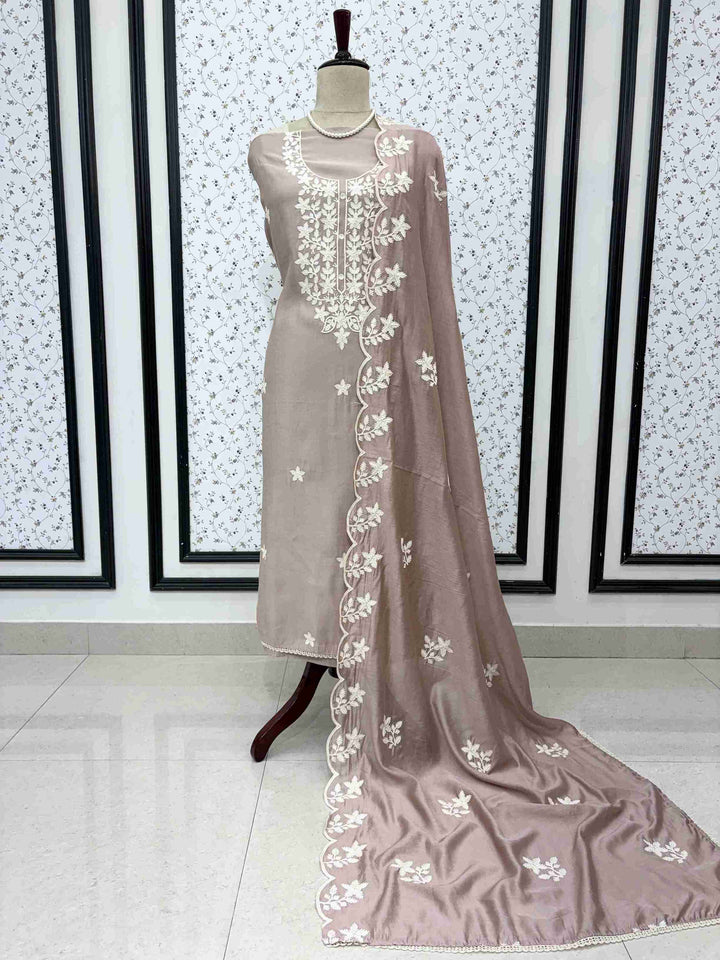 Mauve jaam cotton unstitched suit full front view with crotia embroidered dupatta draped on mannequin