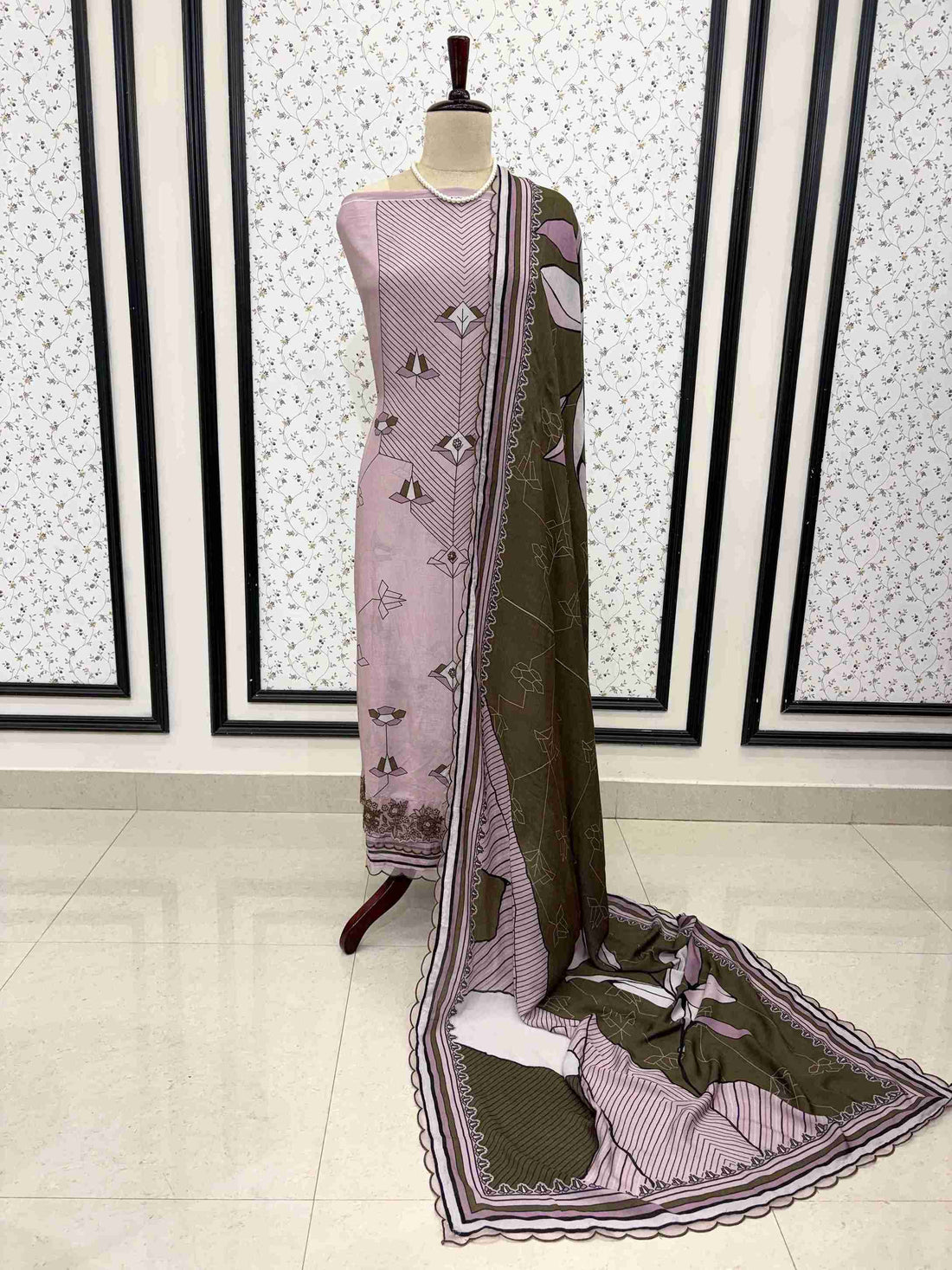Mauve Pink and Olive Green pure muslin digital print unstitched suit set displayed on mannequin with embroidered organza border dupatta