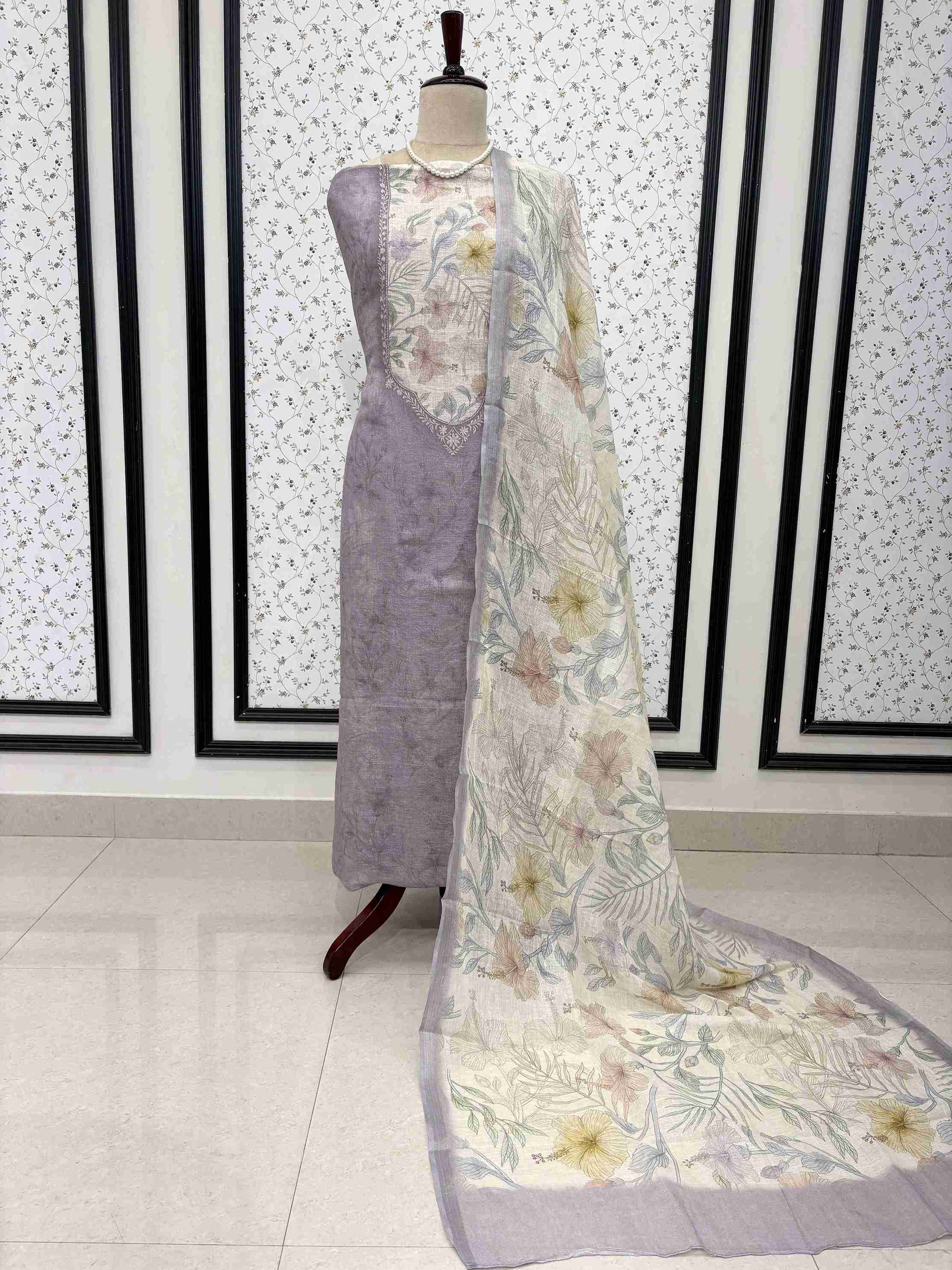 Mauve purple pure linen unstitched suit full front view with off-white multicolor floral printed dupatta draped on mannequin