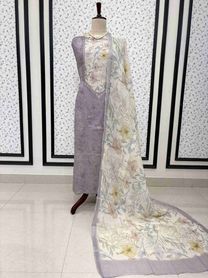 Mauve purple pure linen unstitched suit full front view with off-white multicolor floral printed dupatta draped on mannequin