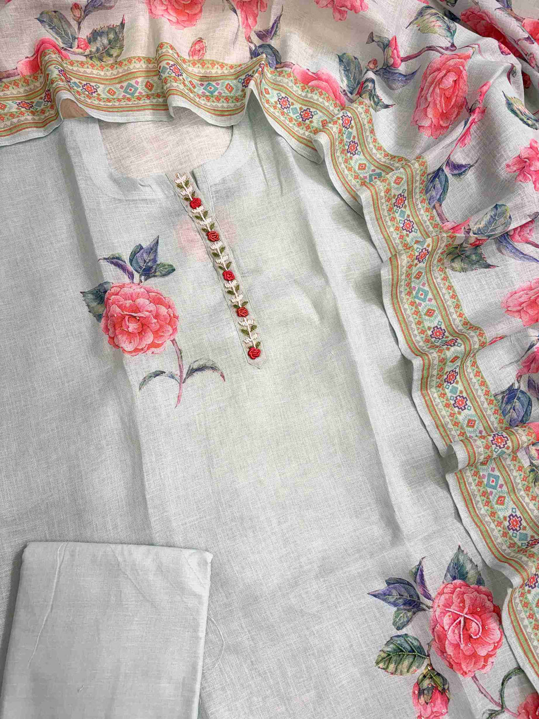 Complete mint blue linen unstitched suit flat lay set with shirt, dupatta, and matching cotton bottom