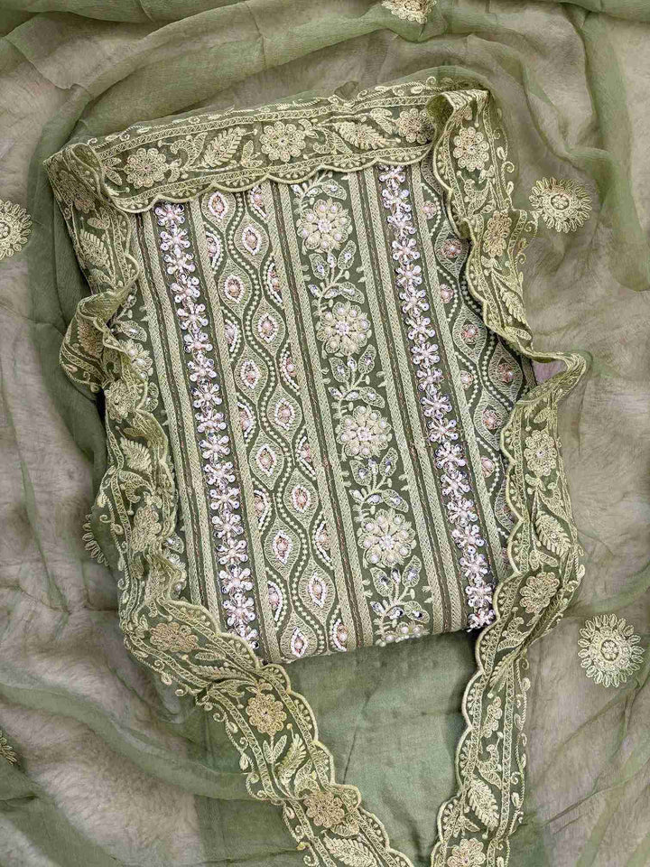 Mint green heavy chikankari georgette unstitched suit set front view