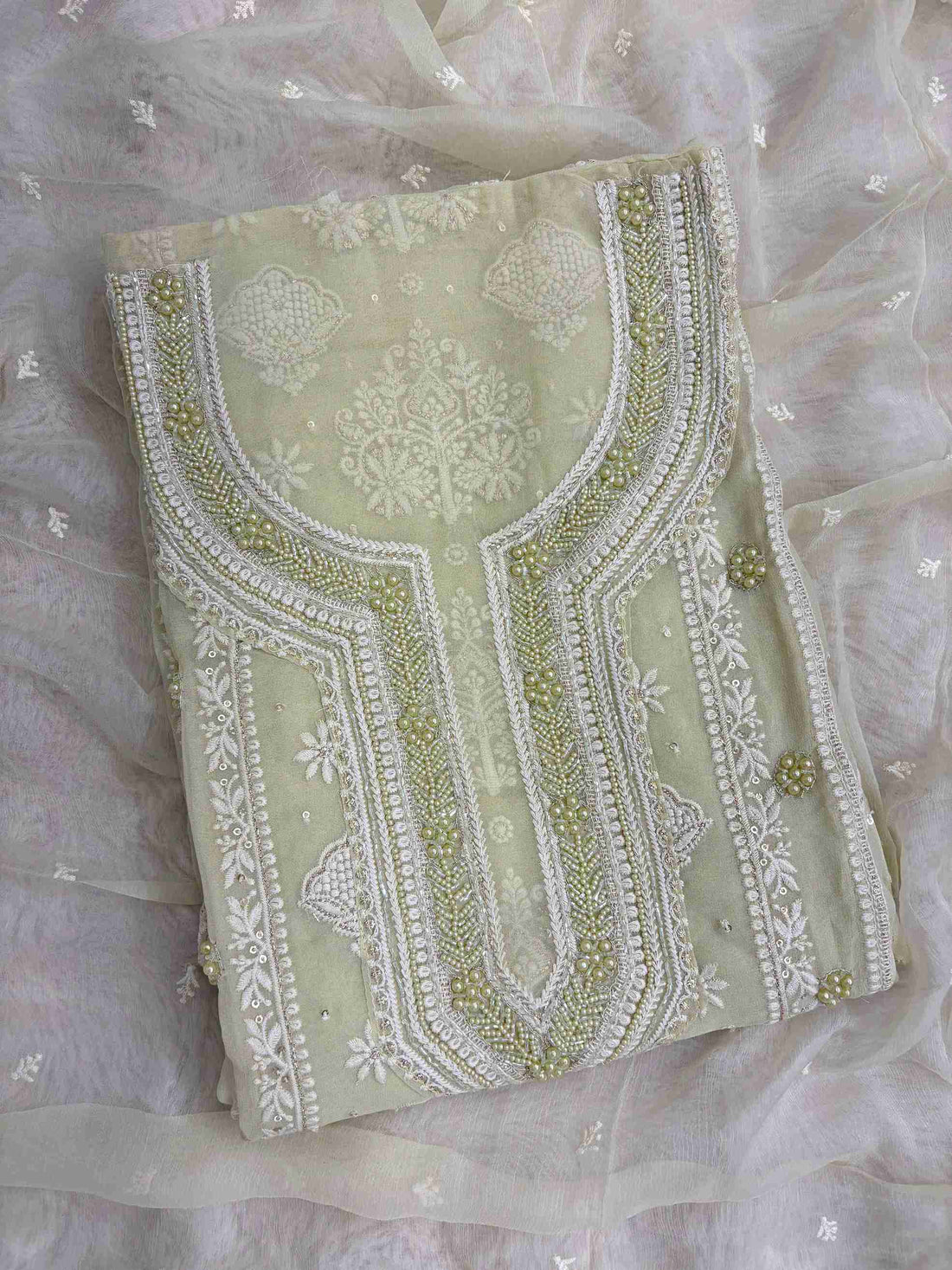 Mint green georgette chikankari suit with moti and bead embellished neckline