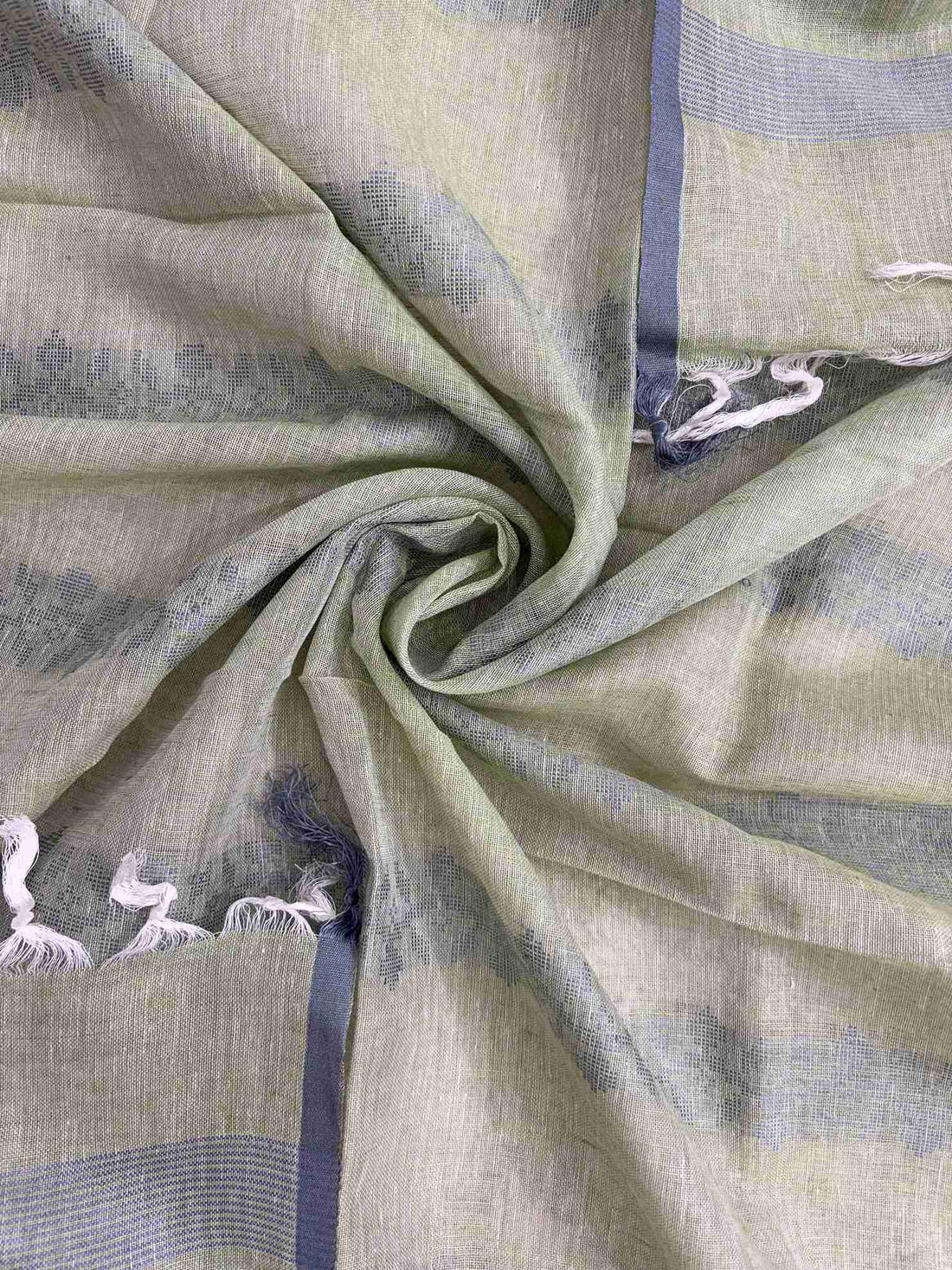 Woven linear texture detail on mint green pure linen dupatta