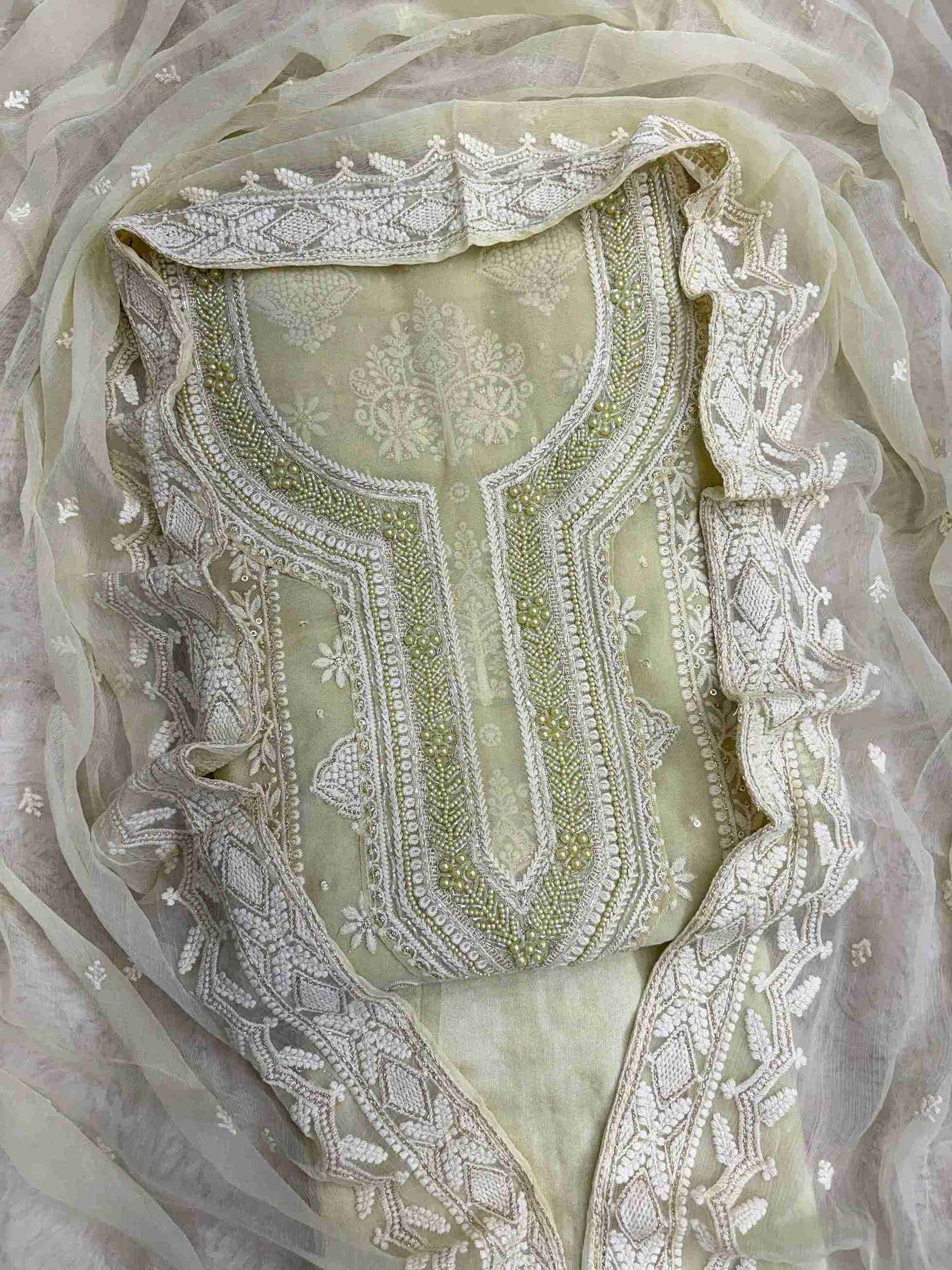 Mint green heavy chikankari wedding wear unstitched suit set front view