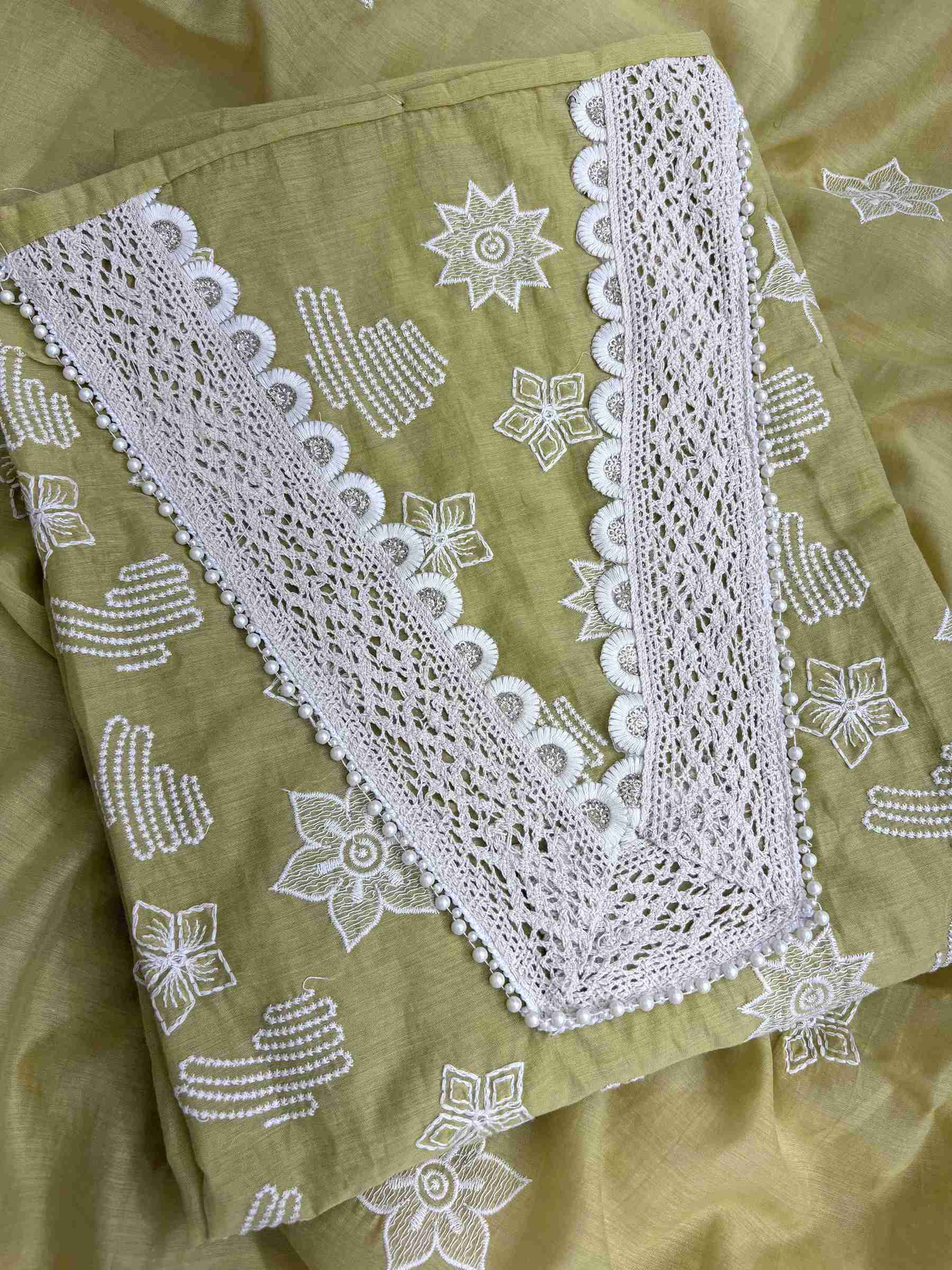 Geometric thread embroidery on mint green mul chanderi suit