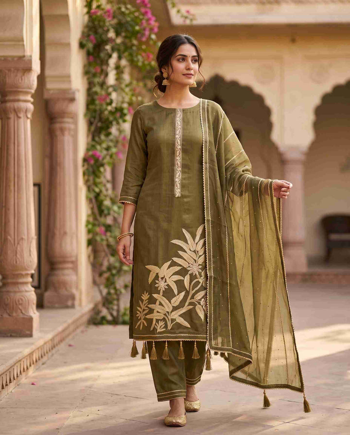 Model wearing Olive green Burberry tissue unstitched suit with gota palm motif daaman and gota lace dupatta