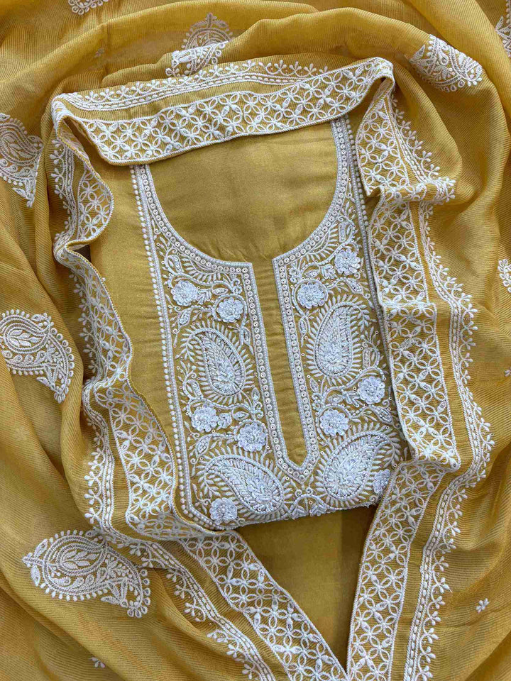 Mustard chikankari unstitched georgette suit set with chiffon dupatta