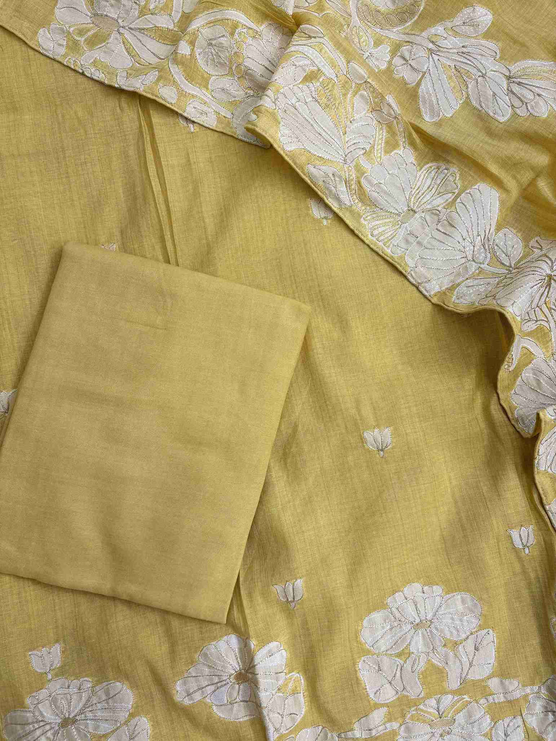 Mul chanderi dupatta with woven floral borders and coordinated design