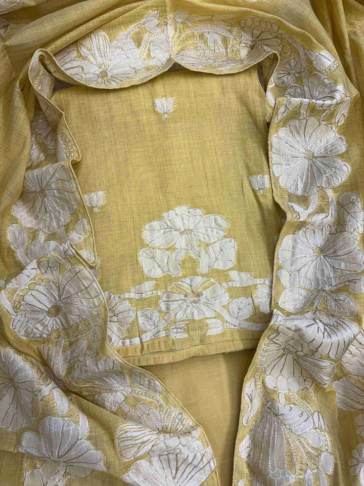 Mustard mul chanderi cotton suit with woven floral vine detailing and elegant dupatta front view