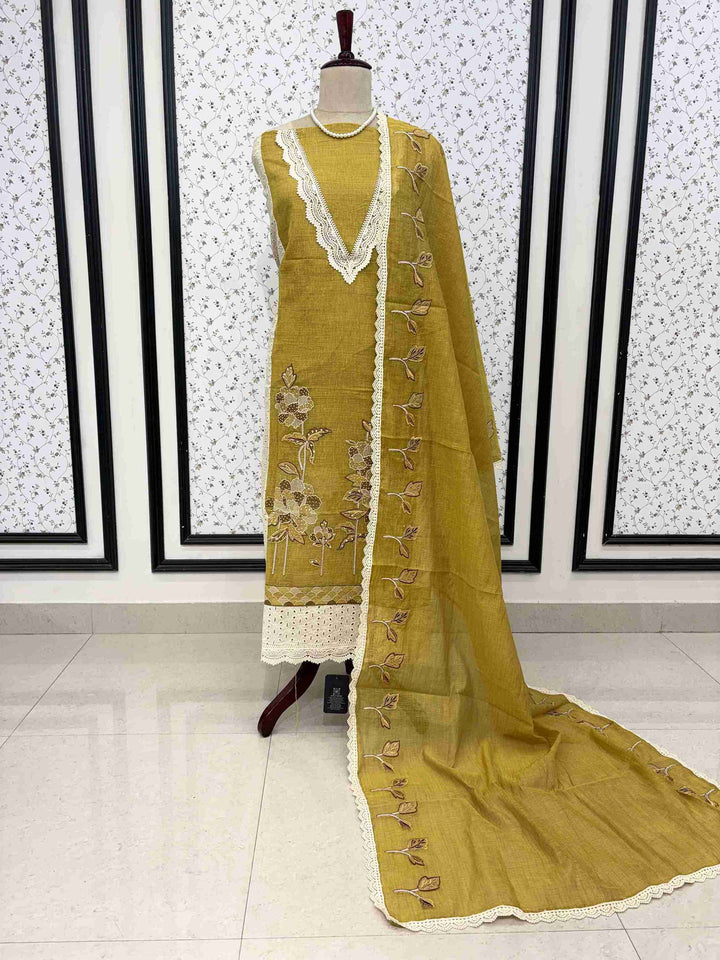 Mustard mul chanderi unstitched suit full front view with dupatta draped on mannequin