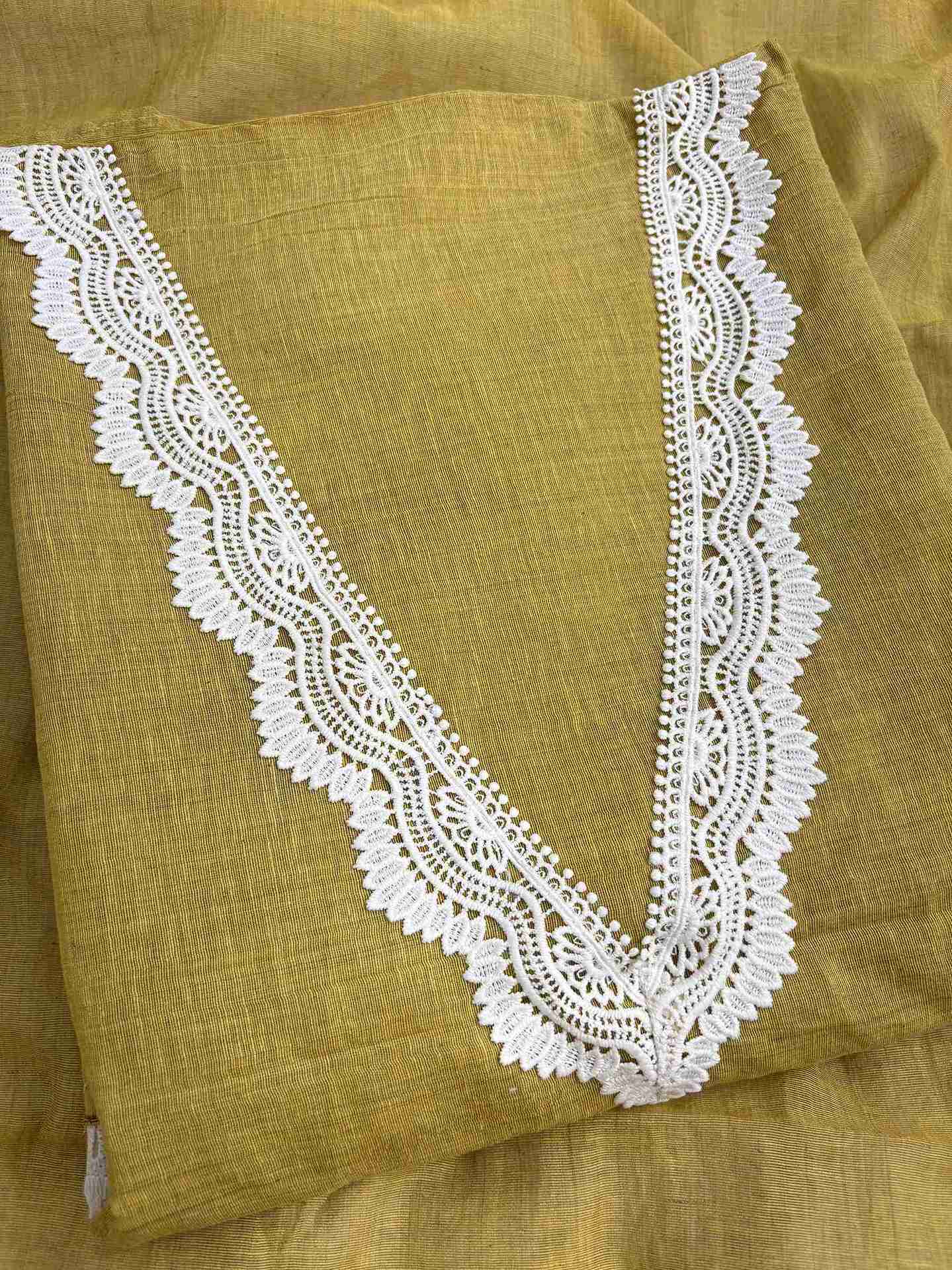 V-neckline detail with crotia lace finishing on mustard mul chanderi shirt