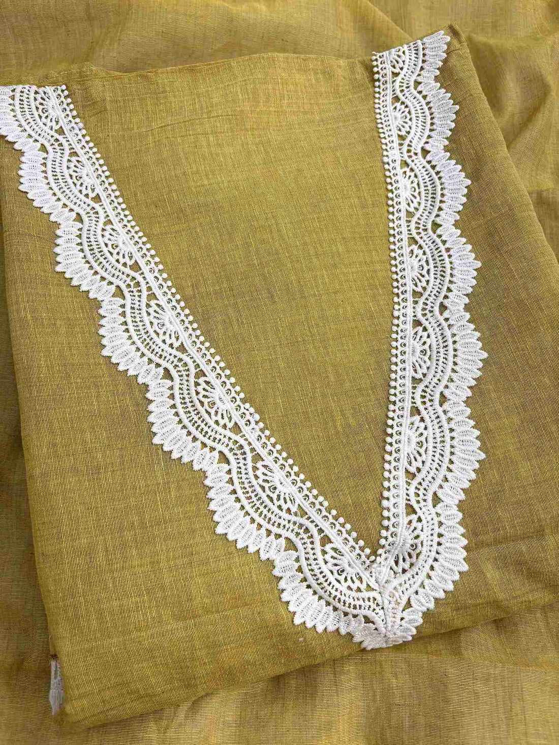 V-neckline detail with crotia lace finishing on mustard mul chanderi shirt