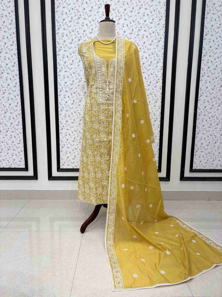 Full unstitched mustard mul chanderi suit set with dupatta and matching bottom