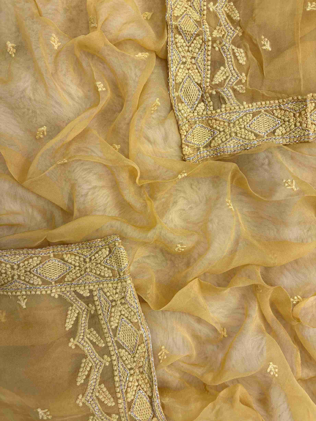 Mustard yellow chiffon dupatta with embroidered border and delicate detailing