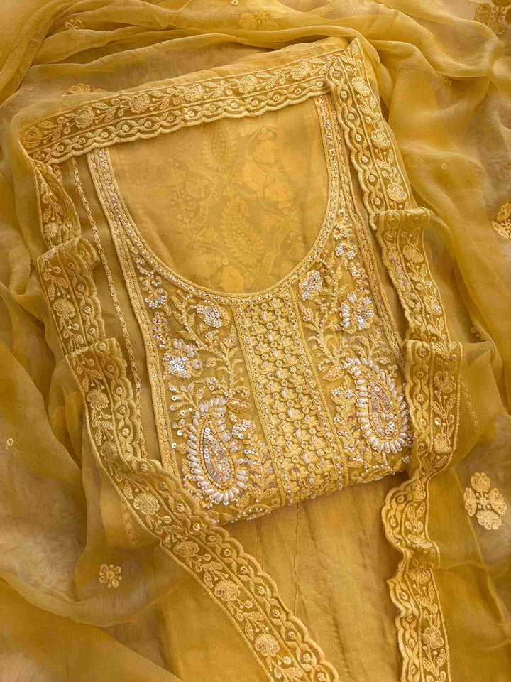 Mustard yellow chikankari embroidered georgette unstitched suit set