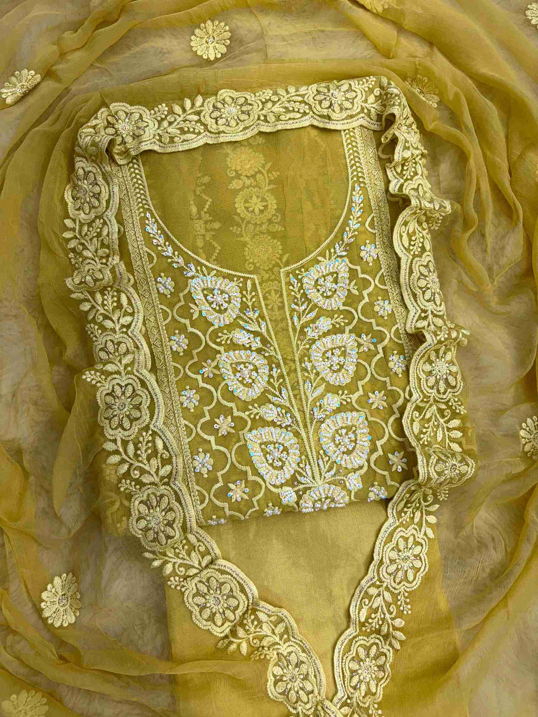Mustard yellow chikankari georgette unstitched suit set with chiffon dupatta