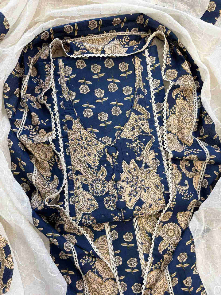 All-over golden floral and paisley print with broad applique hemline border on navy blue cotton shirt