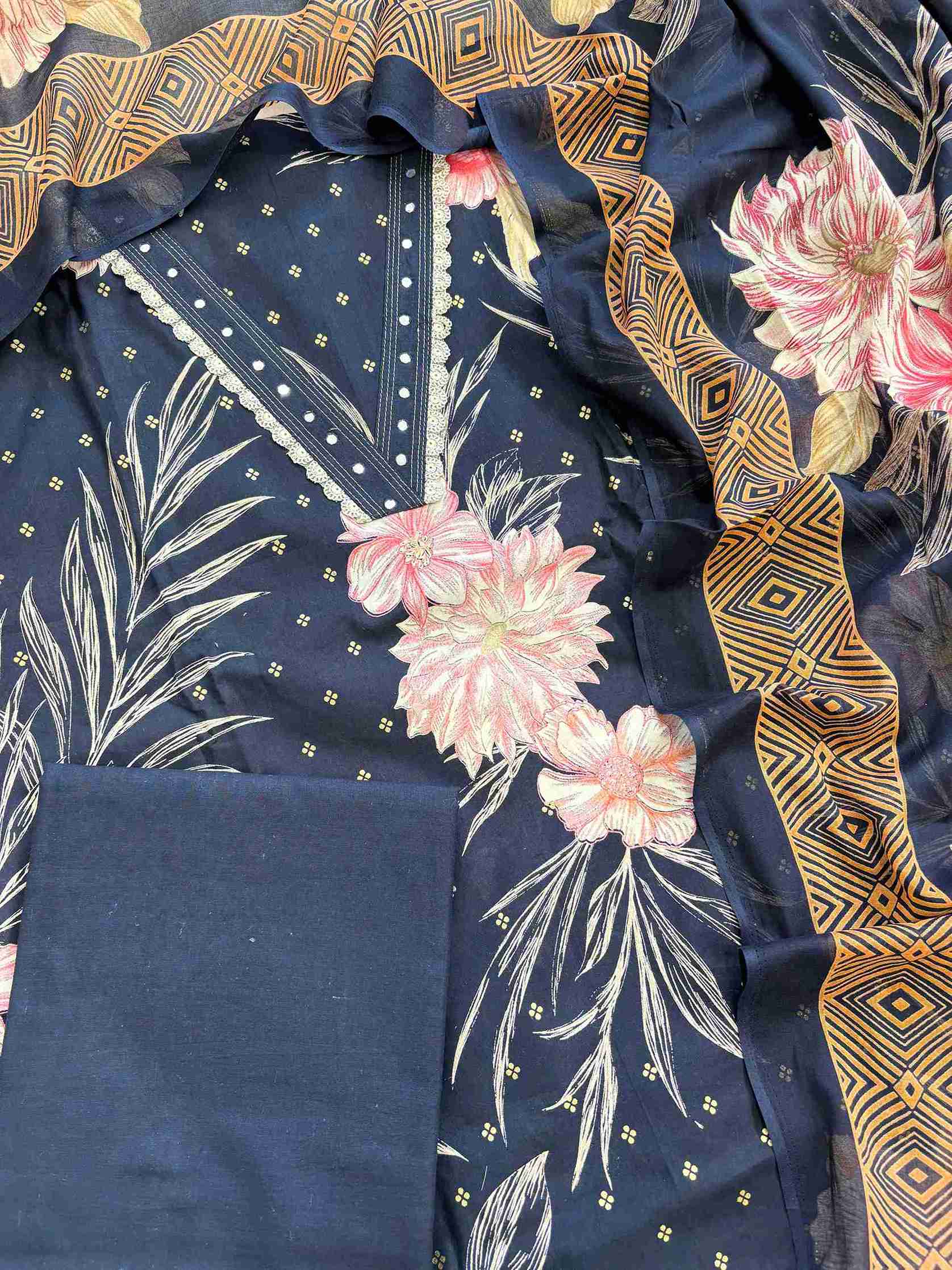 Full length view of navy blue cotton unstitched suit with floral print