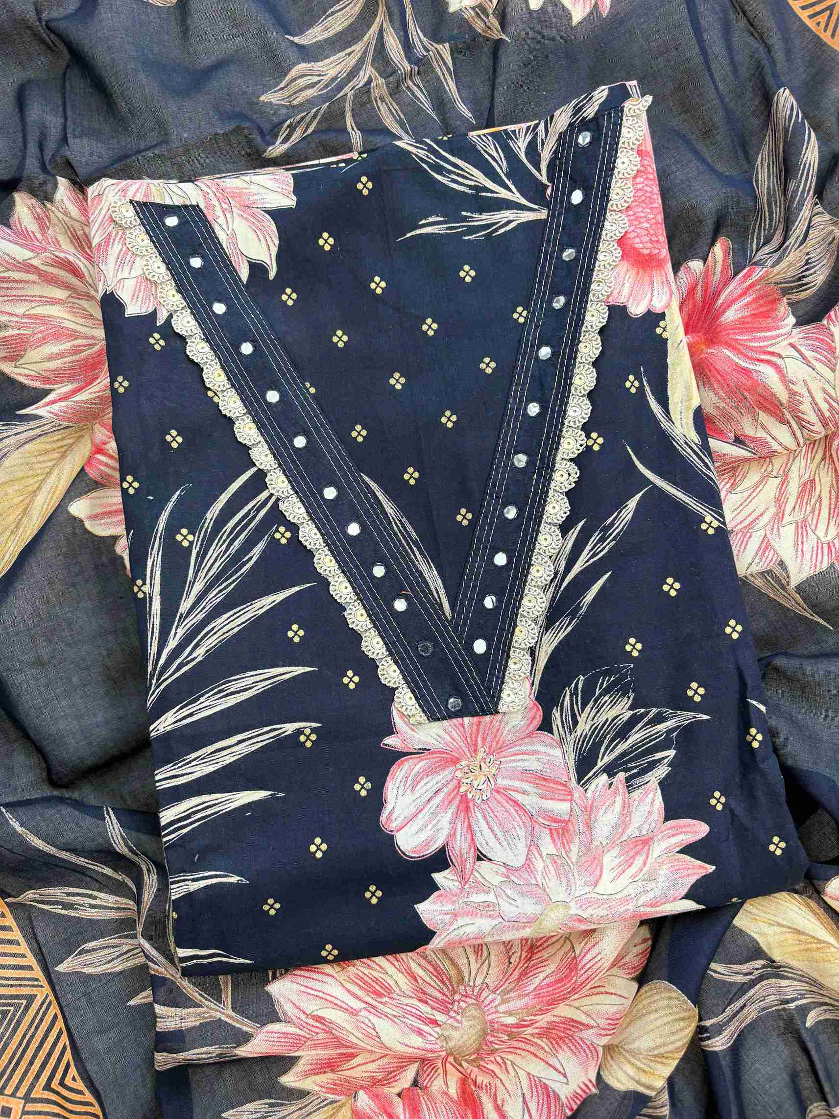 Close-up of navy blue cotton kurta fabric with digital floral print