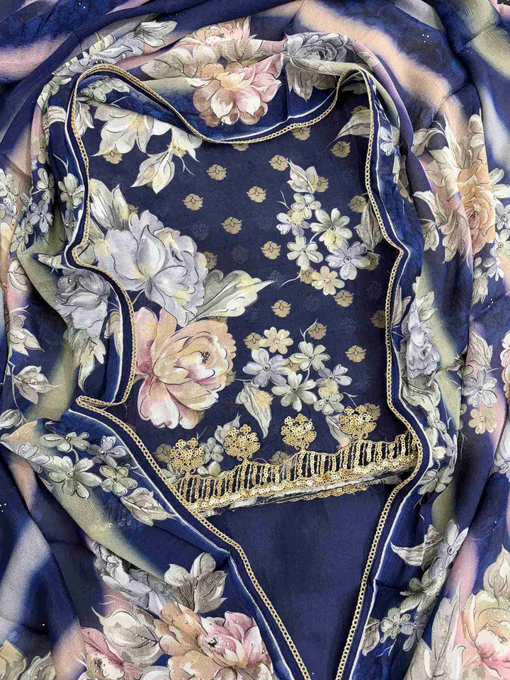 Close-up of all-over digital floral print in contrasting colors on navy blue muslin shirt