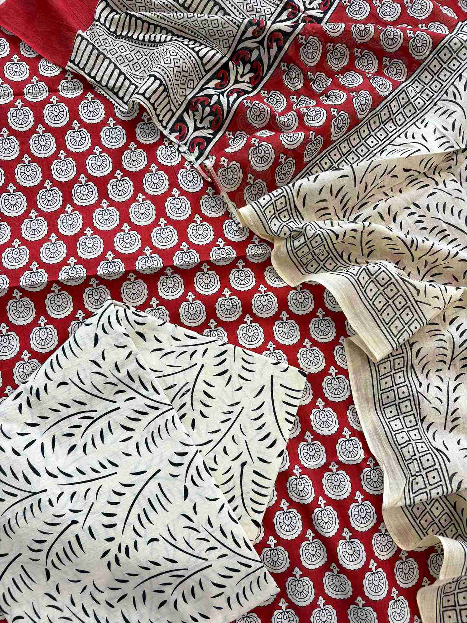 Off white pure cotton bottom fabric with printed design