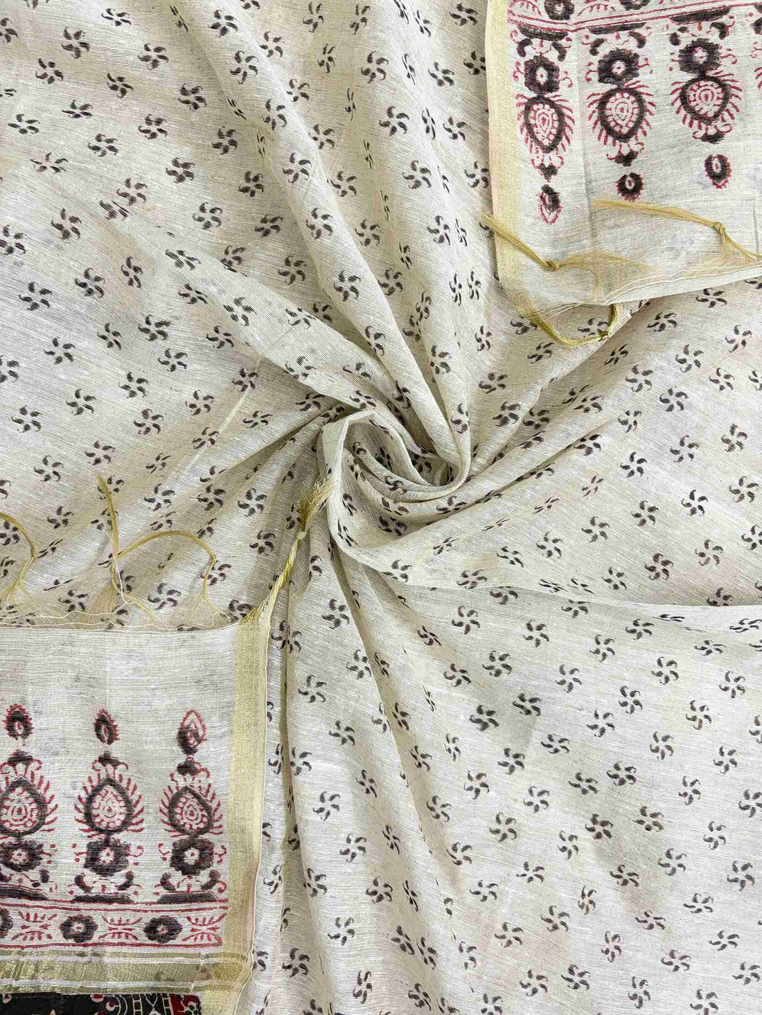 All-over small floral print with ajrak-style zigzag borders on off-white khadi dupatta