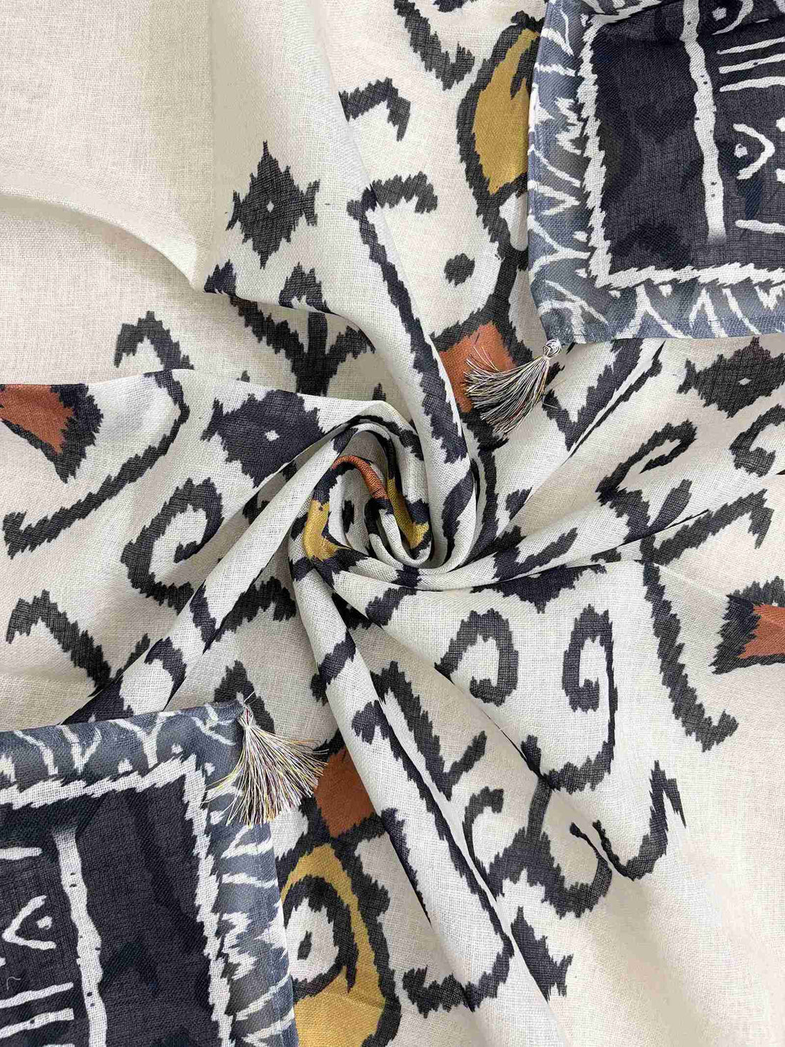 Multicolor ikat geometric print borders in charcoal, grey, and white on off-white linen dupatta longer sides