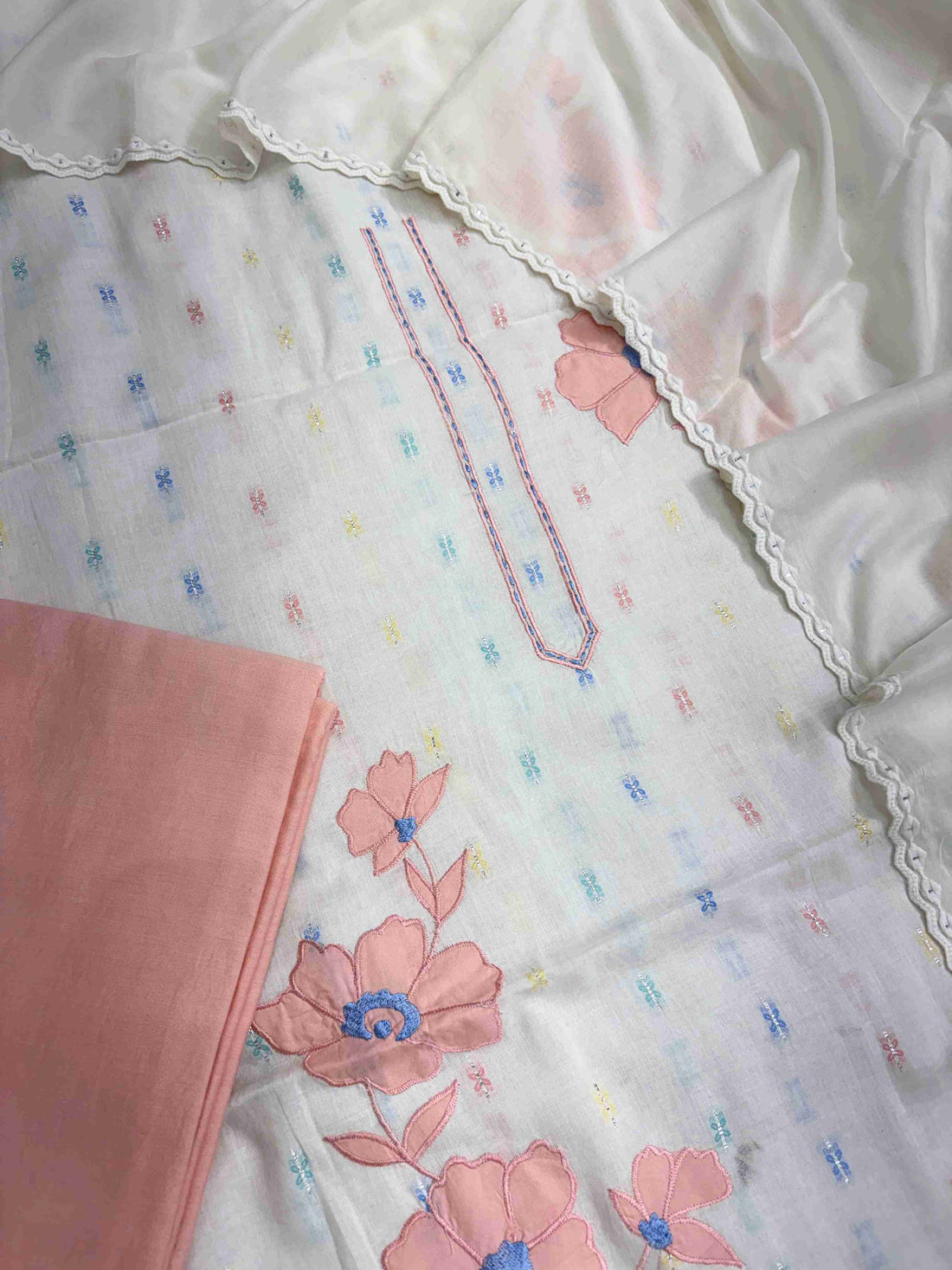 Pink applique floral patches and scalloped crotia lace border on off-white pure cotton dupatta