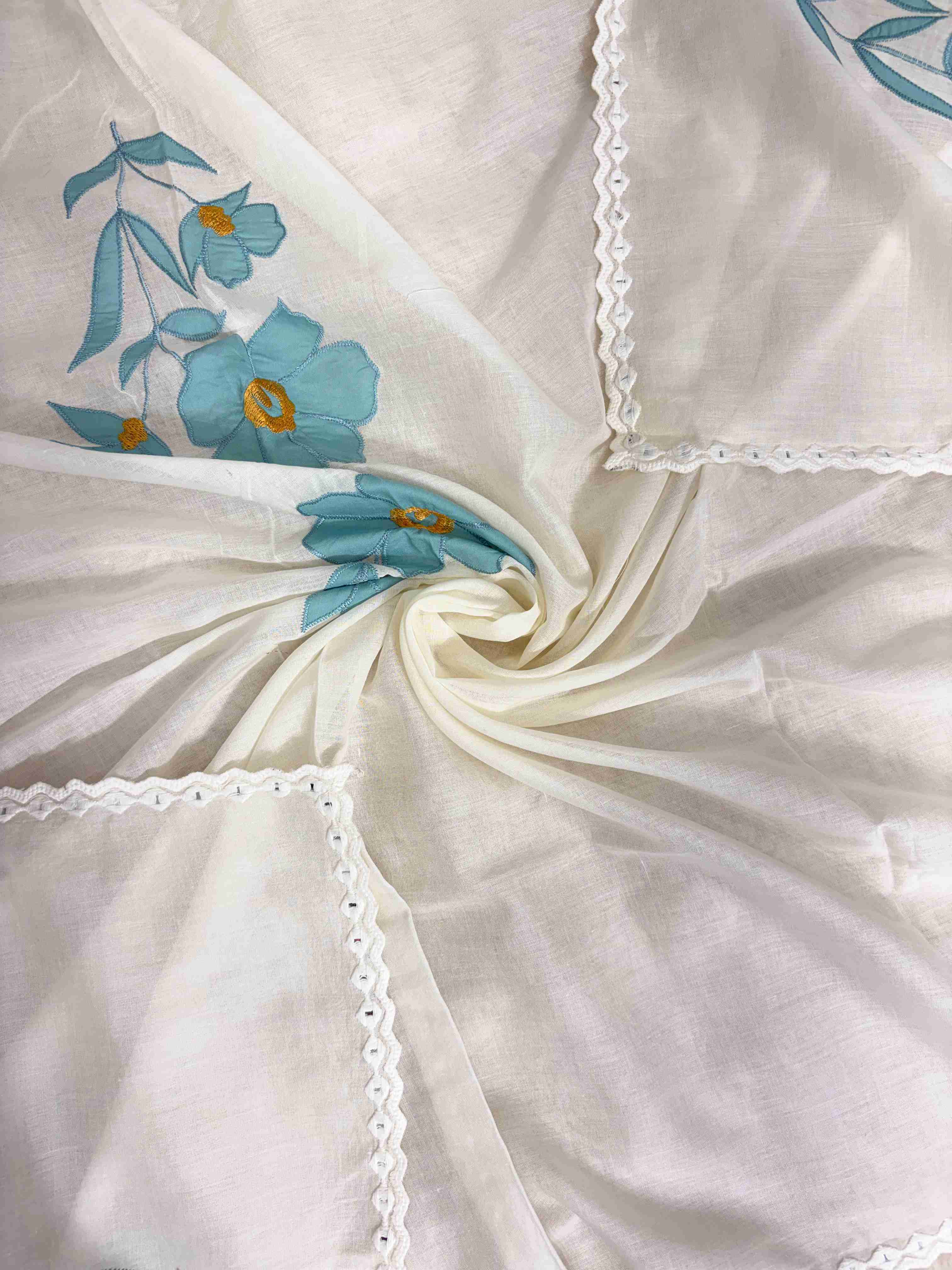Teal blue applique floral patches and scalloped crotia lace border on off-white pure cotton dupatta