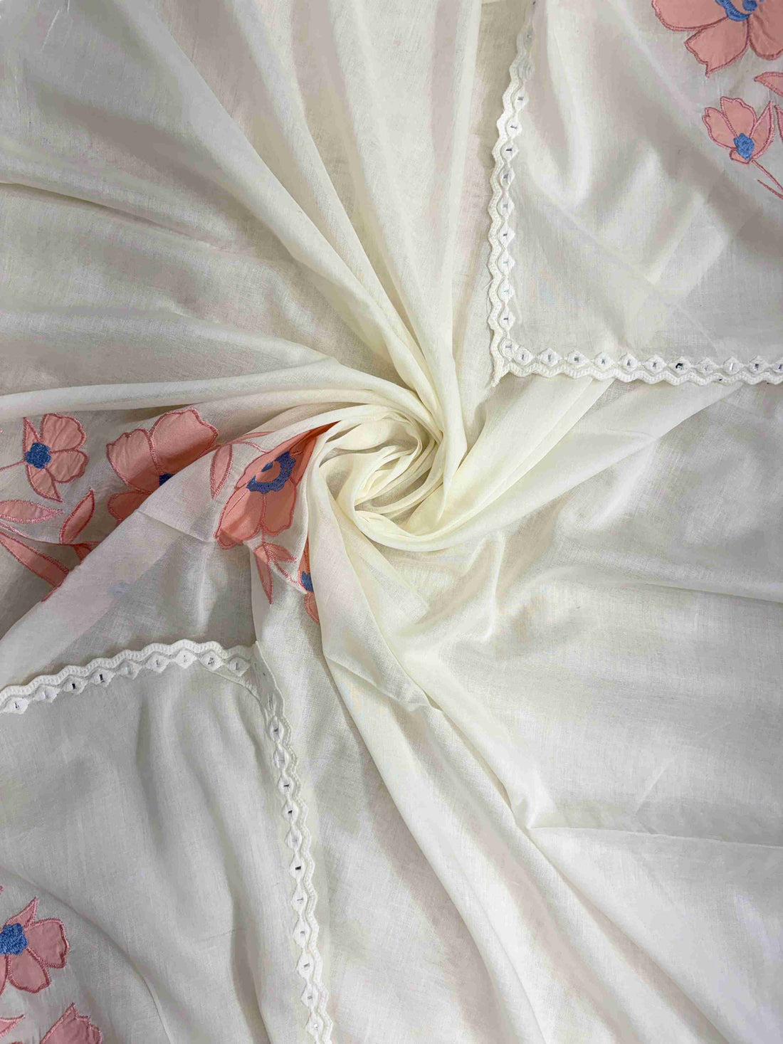 Pink pure cotton bottom fabric detail complementing the off-white shirt and dupatta applique
