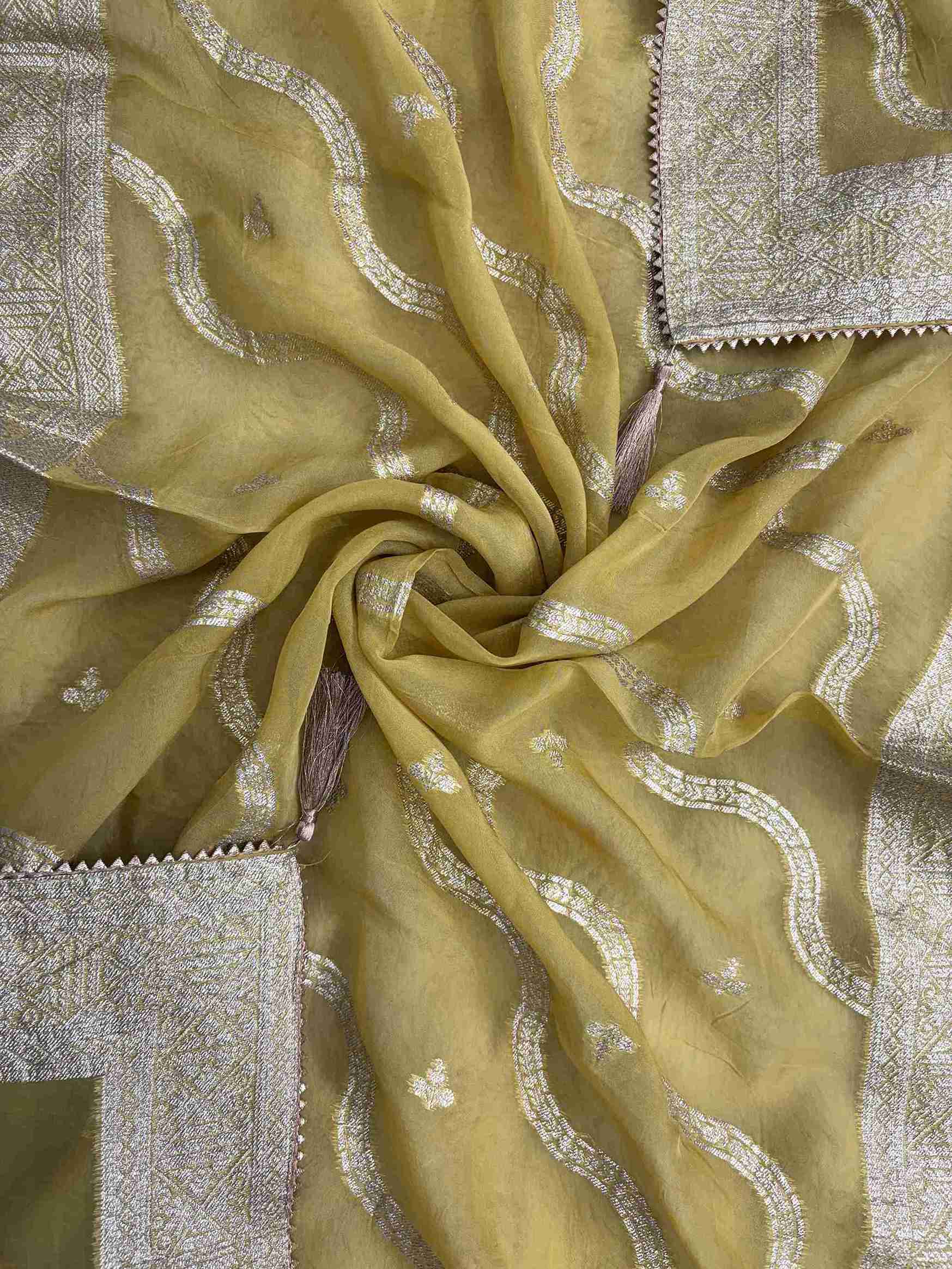 Woven wave and geometric motifs with broad zari borders on olive gold banarasi dupatta