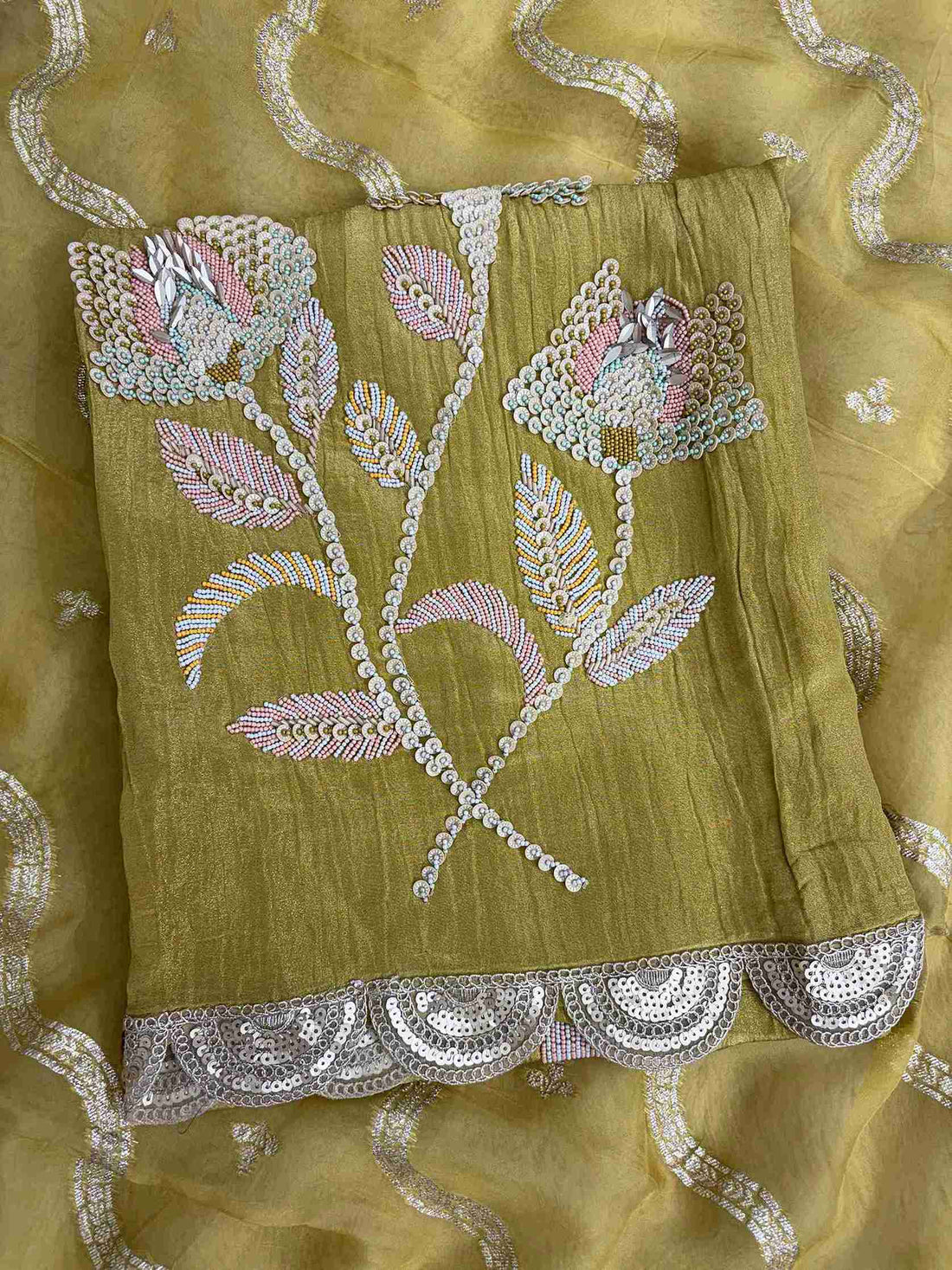 Broad gota border finishing at daaman of olive gold crushed tissue unstitched shirt