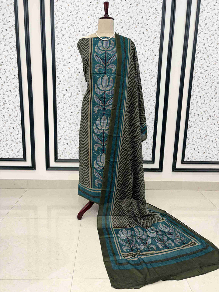 Olive green mul cotton unstitched suit full front view with zigzag and floral motif dupatta draped on mannequin
