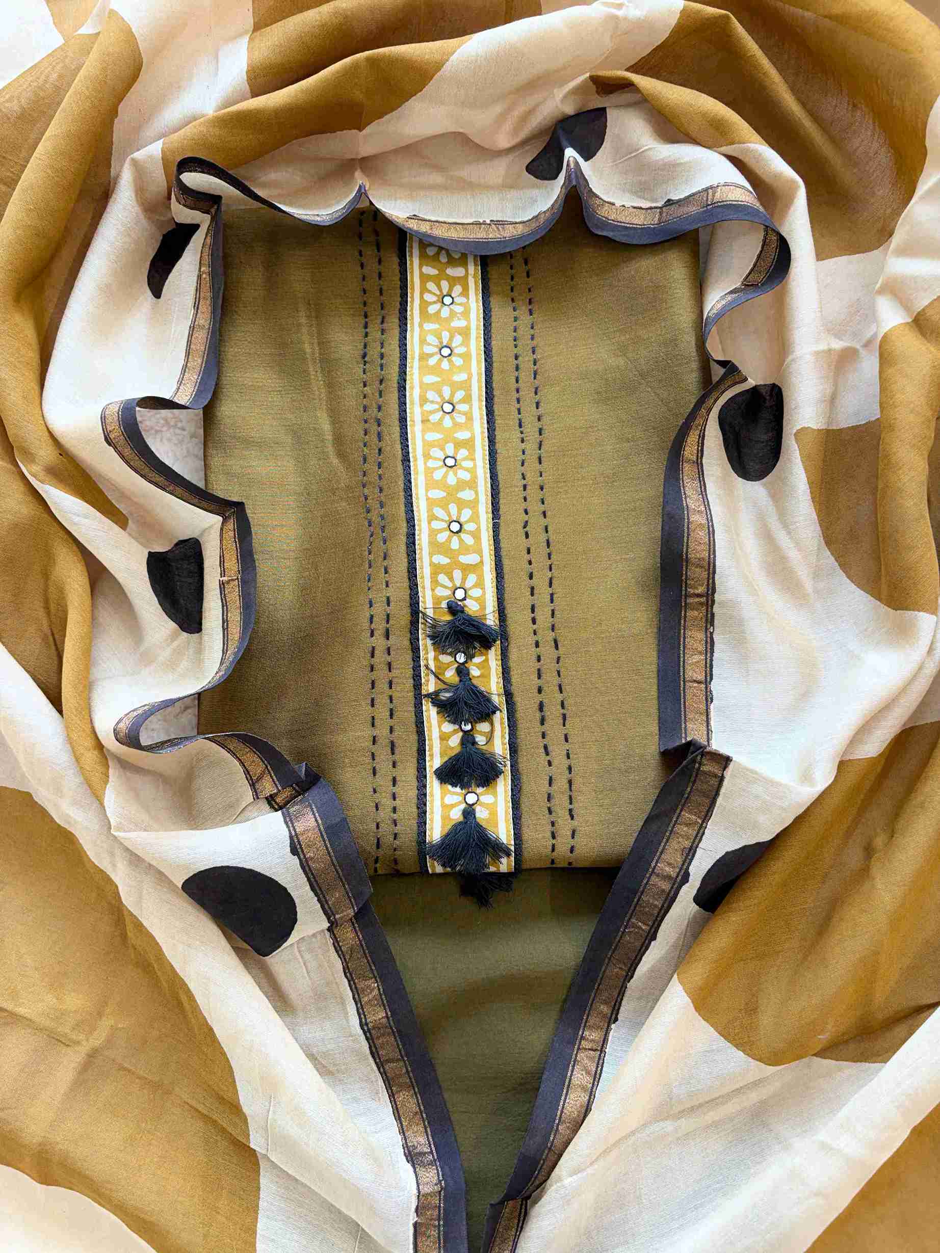Olive Maheshwari silk unstitched suit with tassel placket neckline and hand block printed dupatta