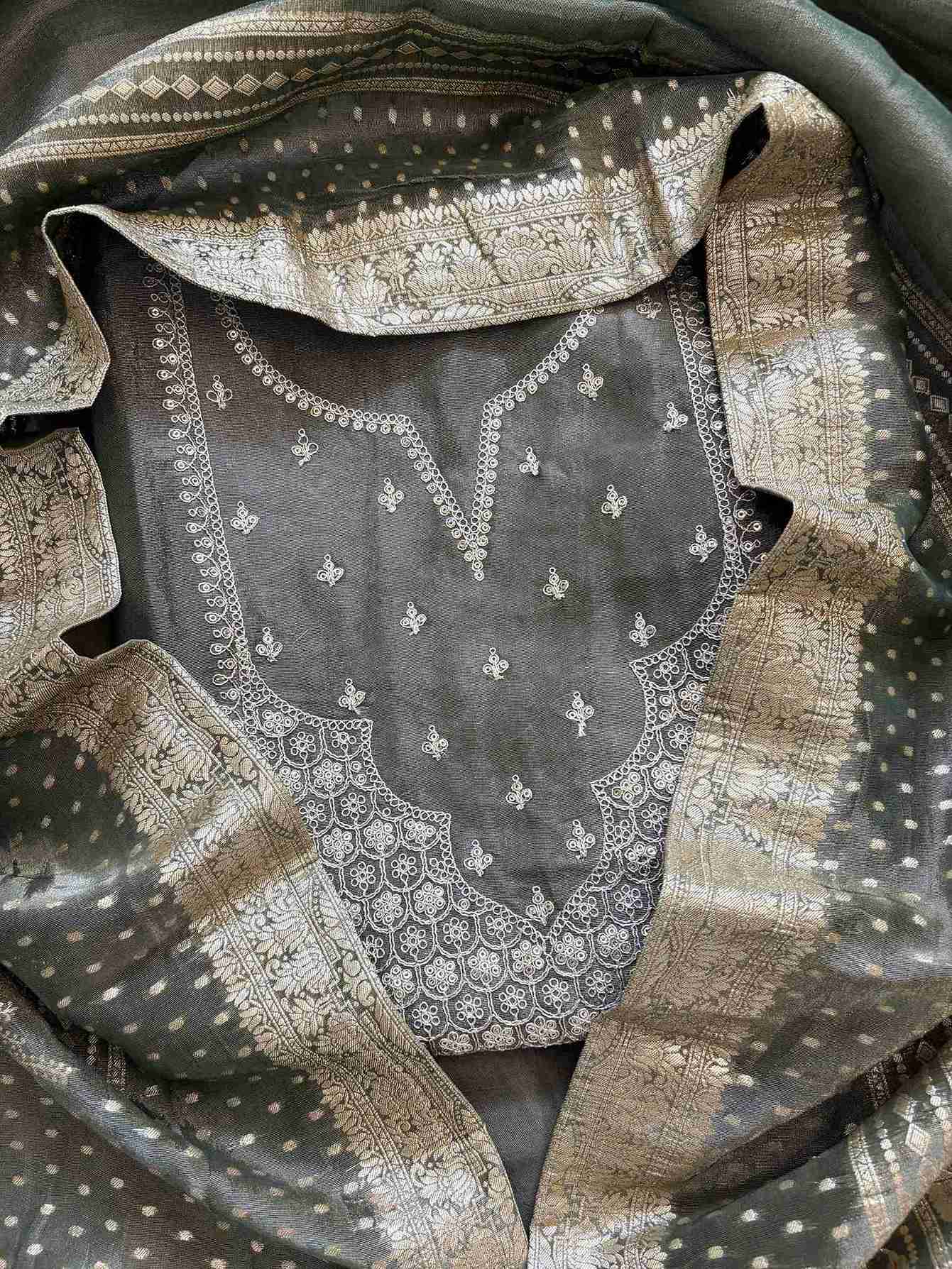 Premium olive organza unstitched suit with golden zari detailing on neckline