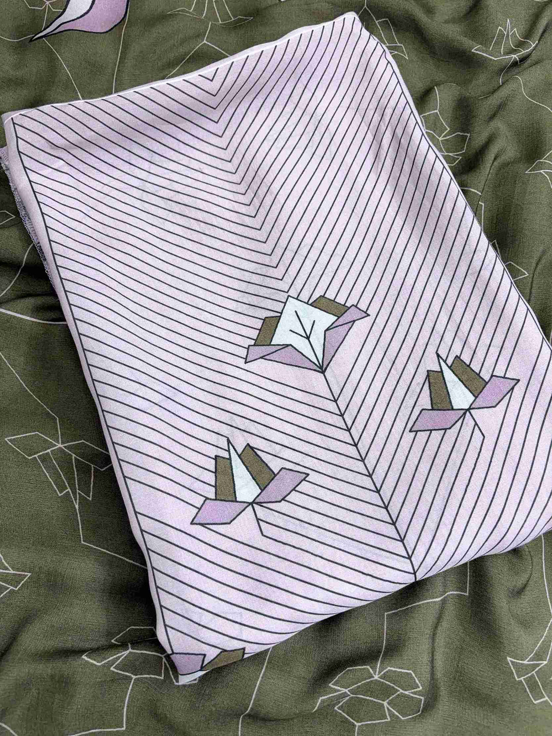 Close up of organza scalloped resham embroidery border on neckline