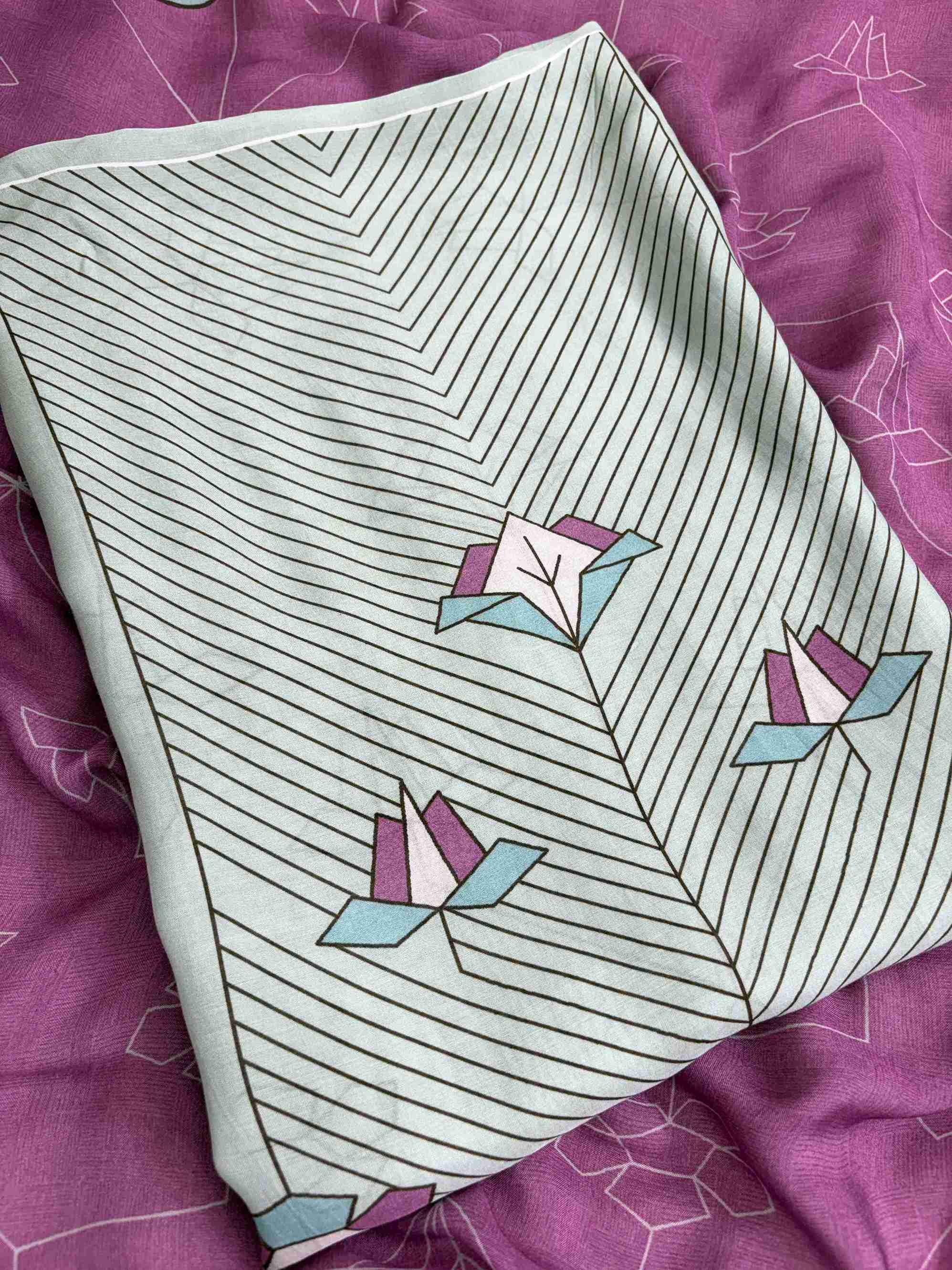 Close up of organza scalloped resham embroidery border on neckline