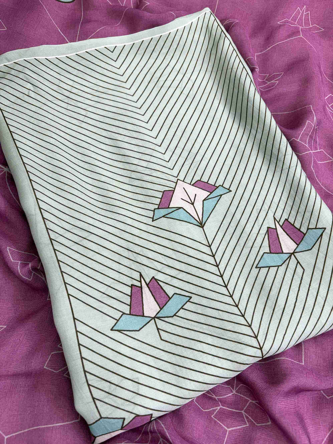 Close up of organza scalloped resham embroidery border on neckline