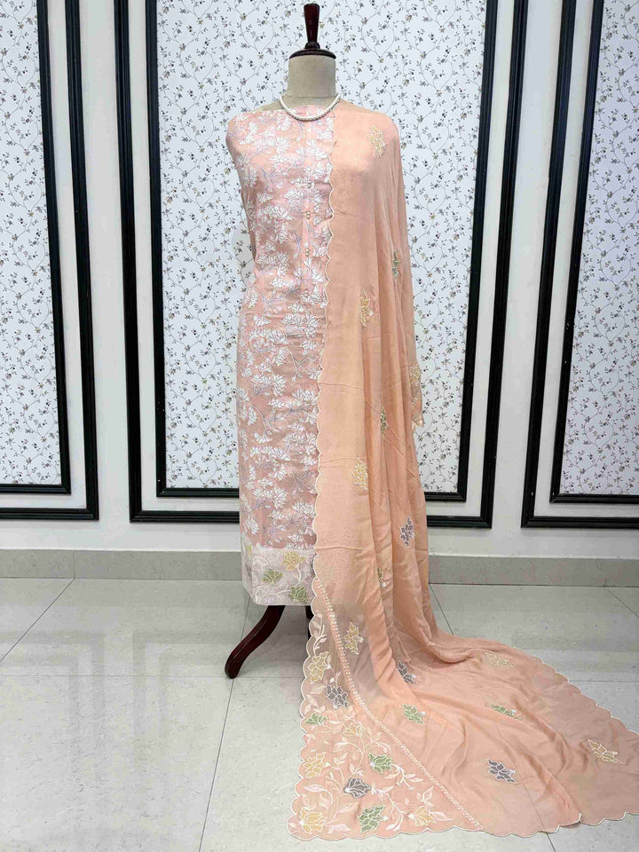 Contrasting cotton bottom detail with abstract streak print paired with peach cotton suit