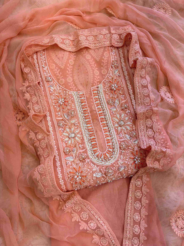 Peach georgette chikankari embroidered unstitched suit front view with chiffon dupatta