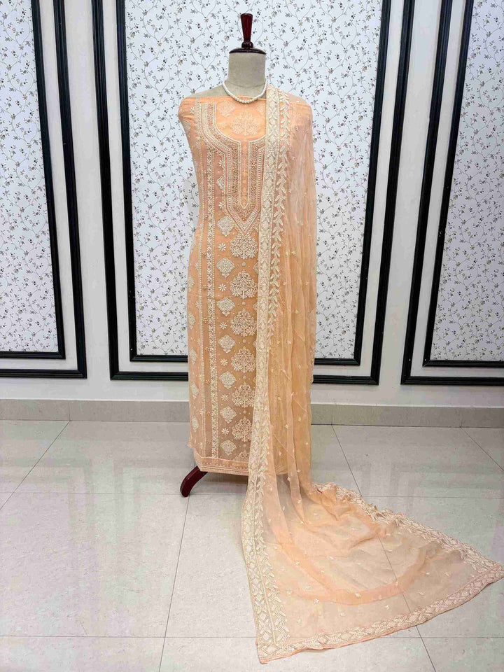 peach heavy chikankari wedding wear unstitched suit set with dupatta
