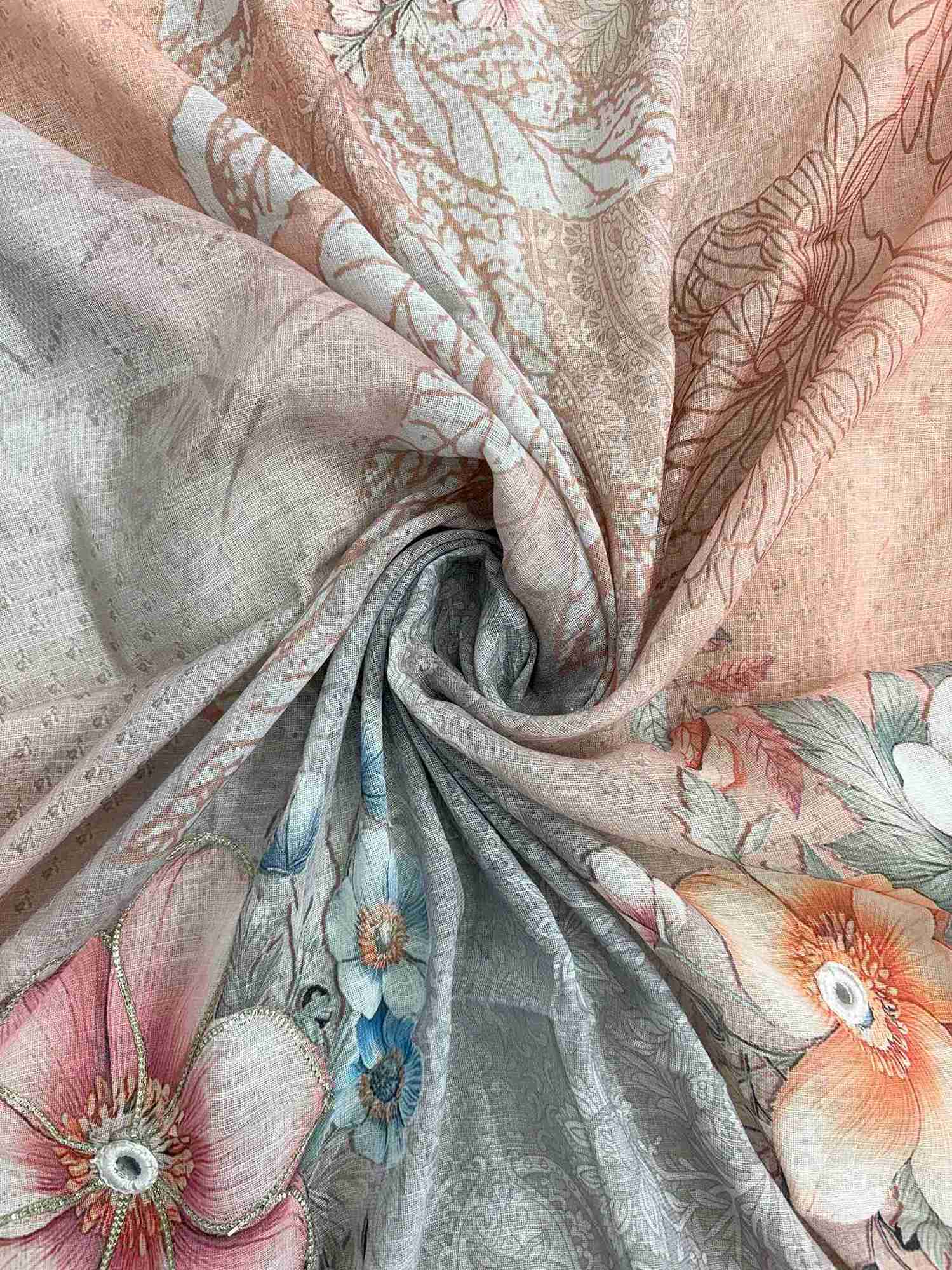 Broad multicolor floral print patches in peach, coral and green tones across powder blue linen dupatta